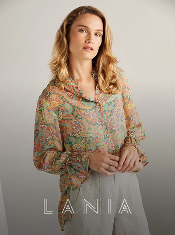 woman wearing Lania The Label outfit modern tailored fashion elegant style