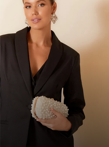 woman wearing Rhianna clothing Australia elegant designer outfit