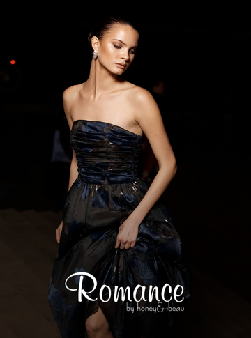 woman wearing soft romantic dress elegant feminine outfit for date night