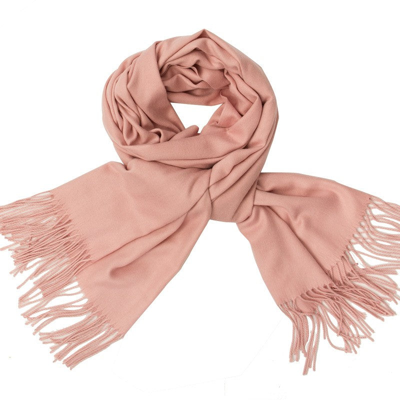 Baby pink cashmere scarf with soft cosy texture and fringes