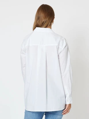 Back view white button-down shirt relaxed fit women’s casual wear
