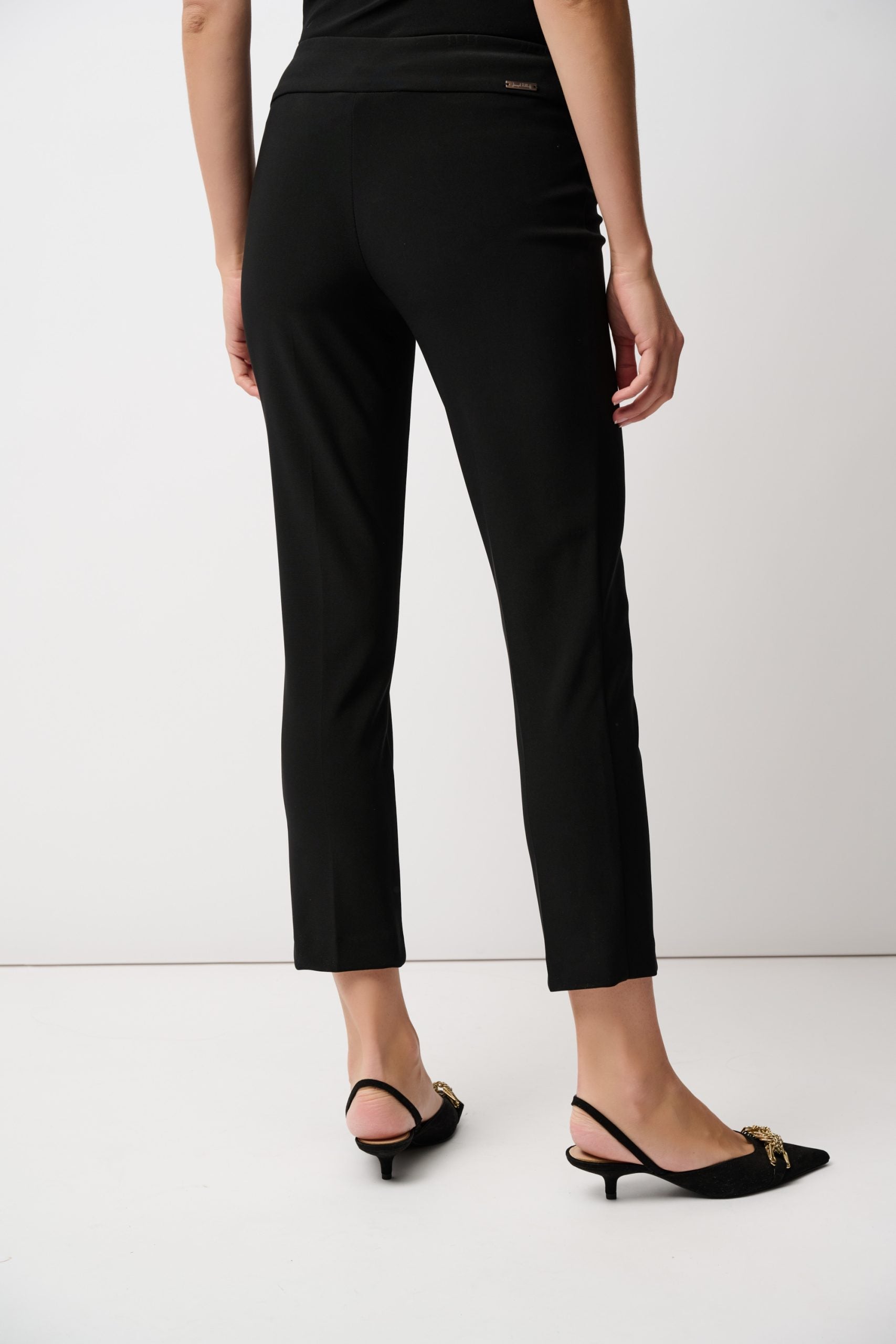 Black slim fit pants back view