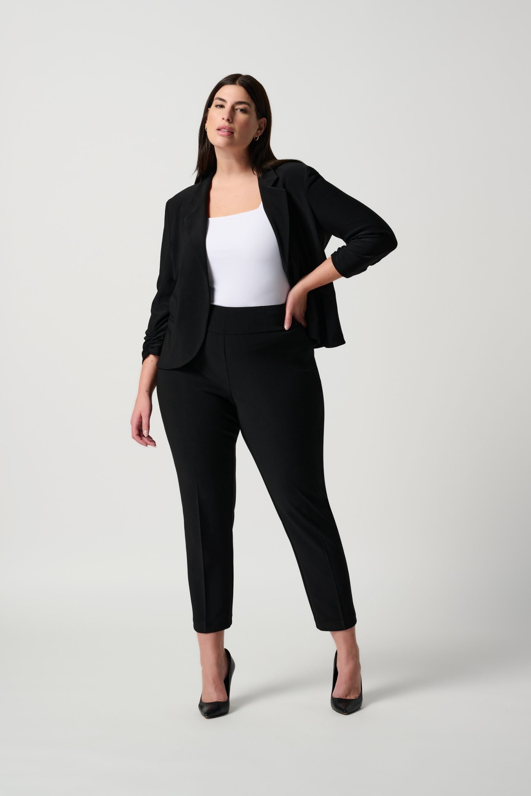 Black slim fit pants styled with blazer