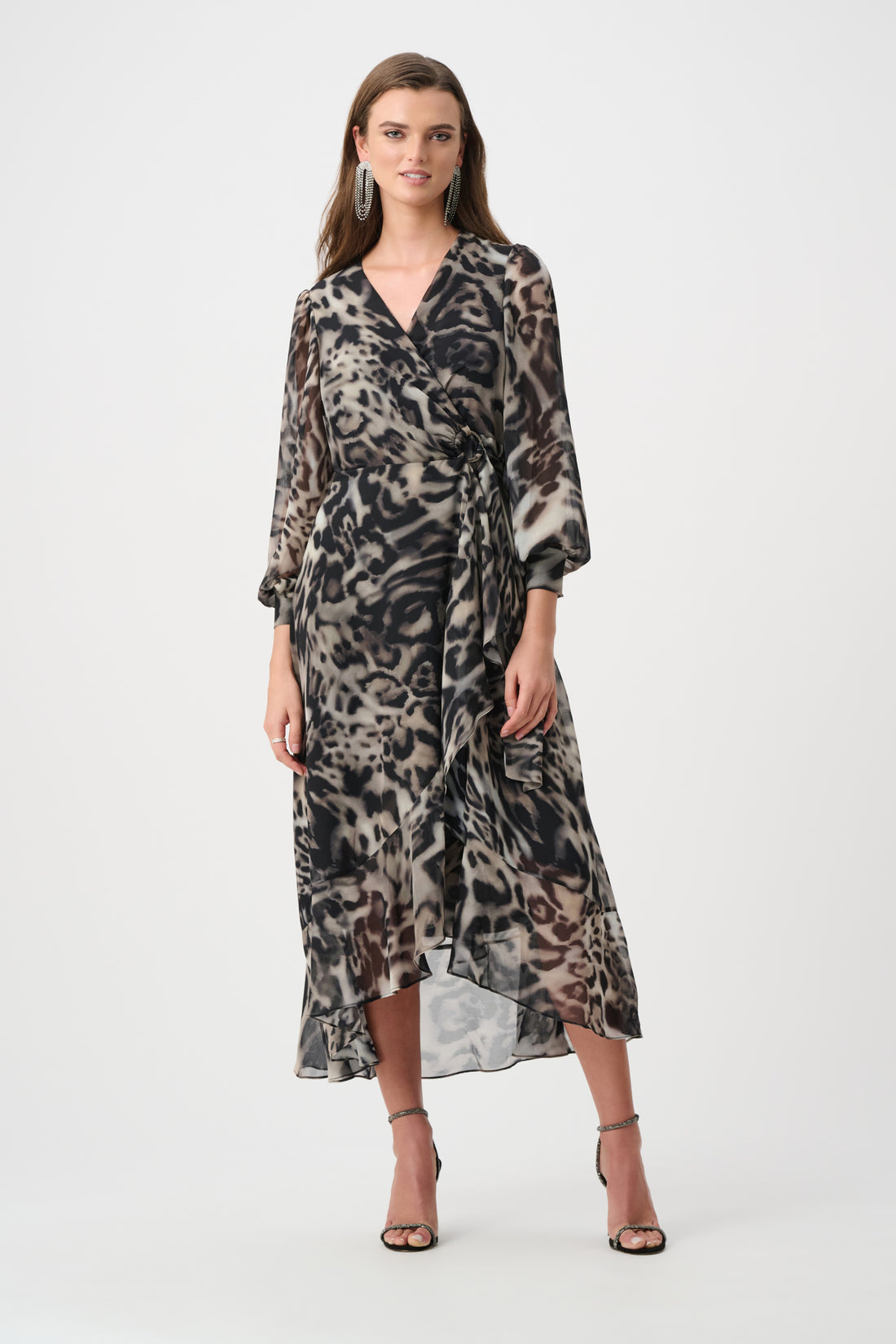 Woman wearing animal print chiffon wrap midi dress