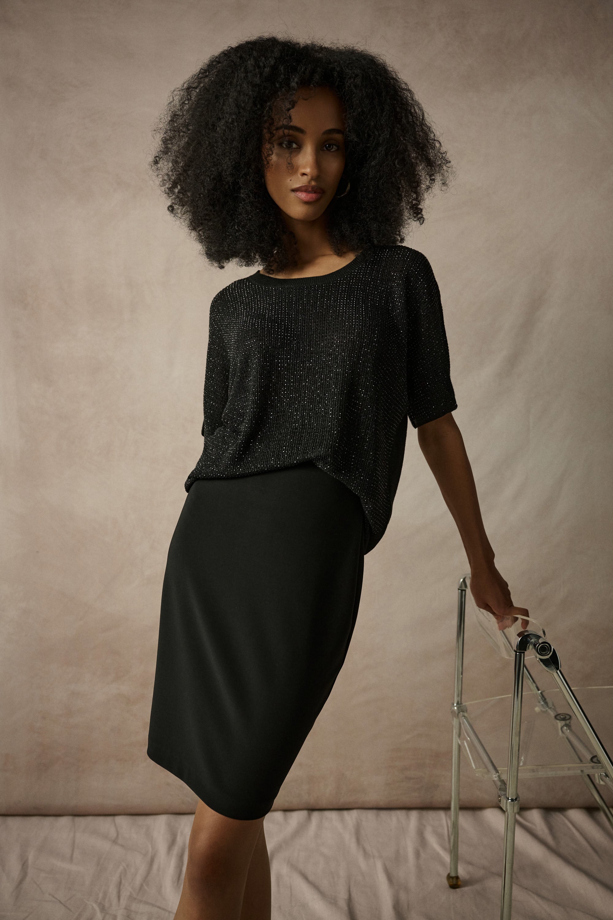 Women’s metallic knit T-shirt with rhinestones, sparkling designer top