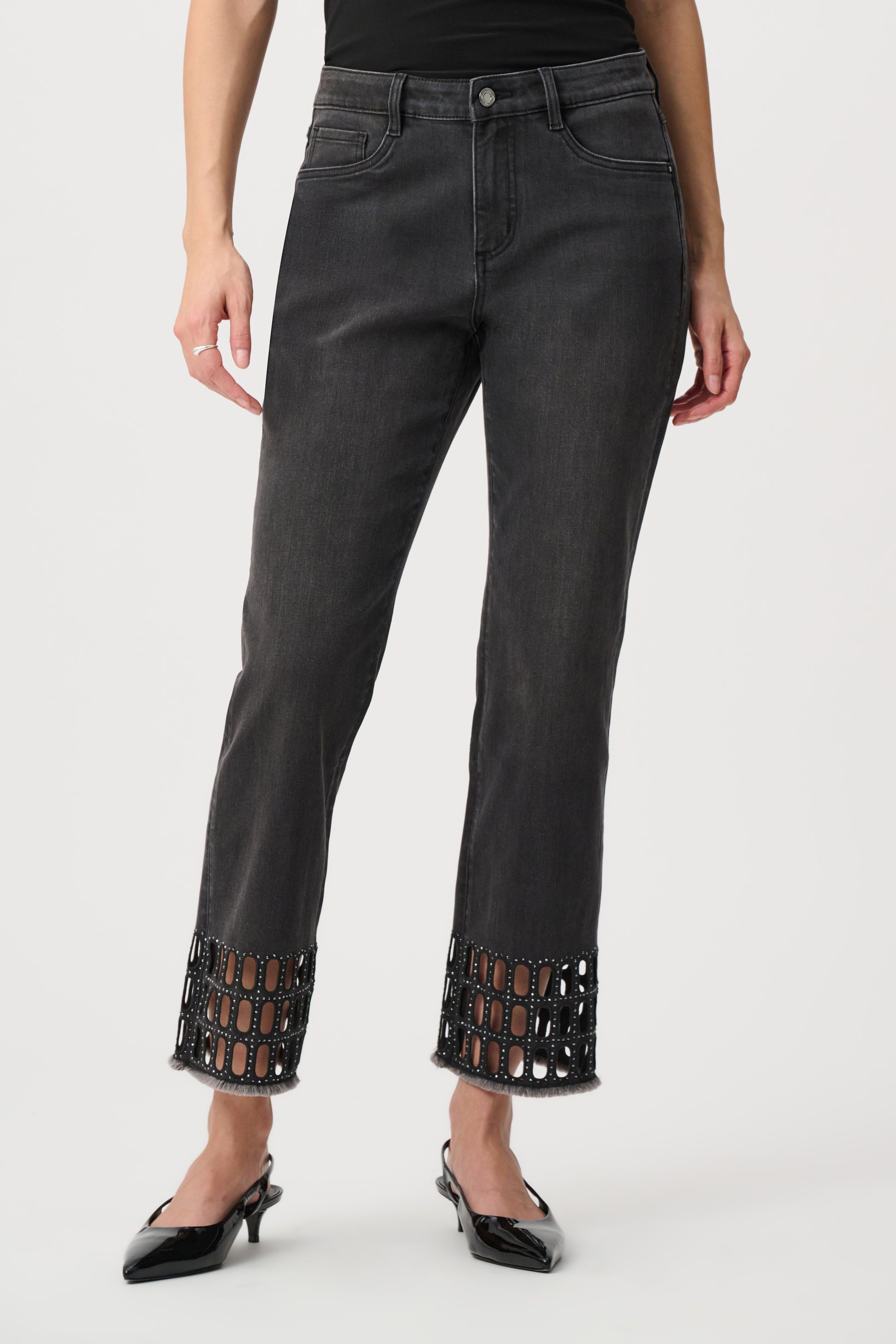 Black straight fit jeans with cut-out hem detail front view