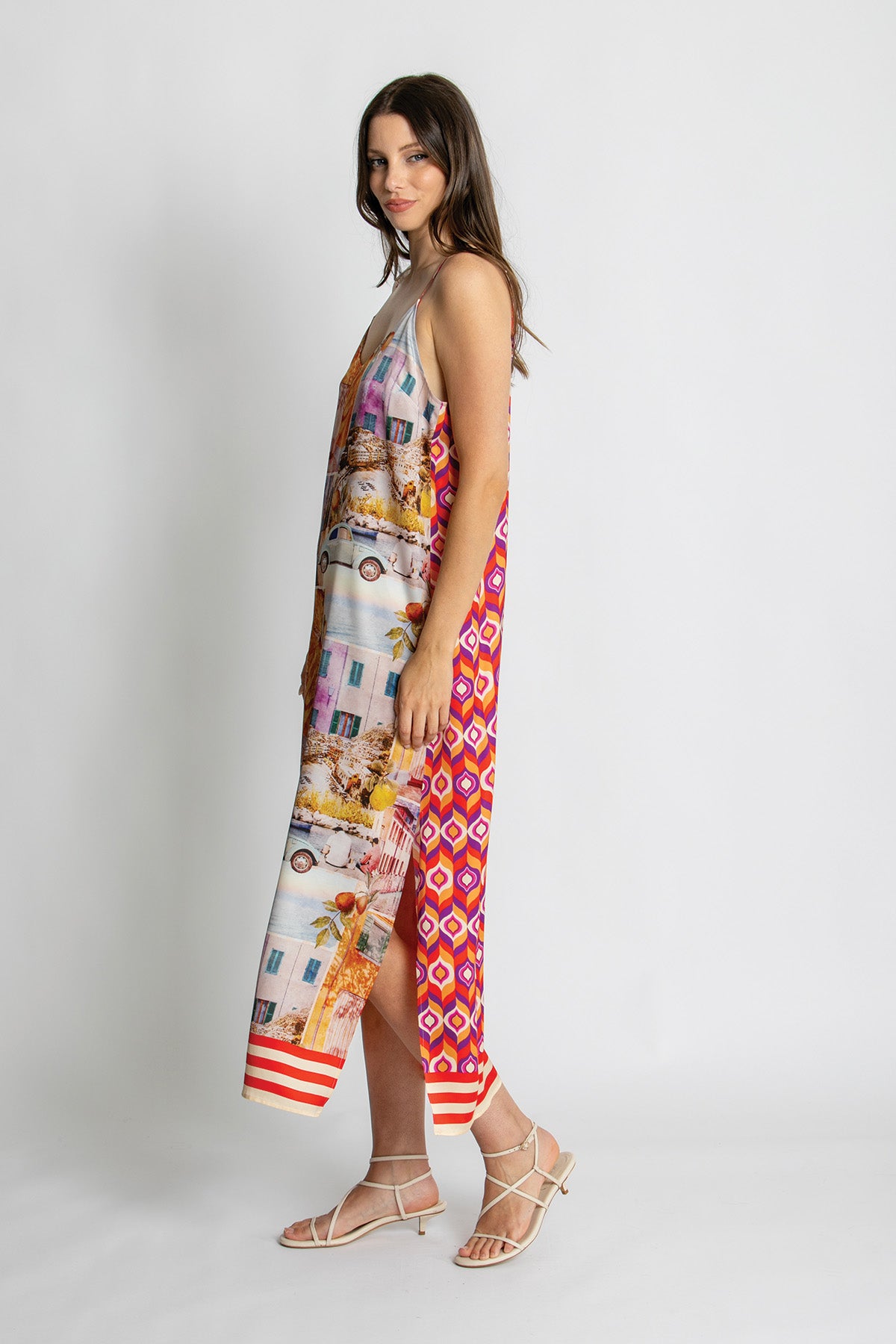 Side view of Mediterranean print strappy midi dress.