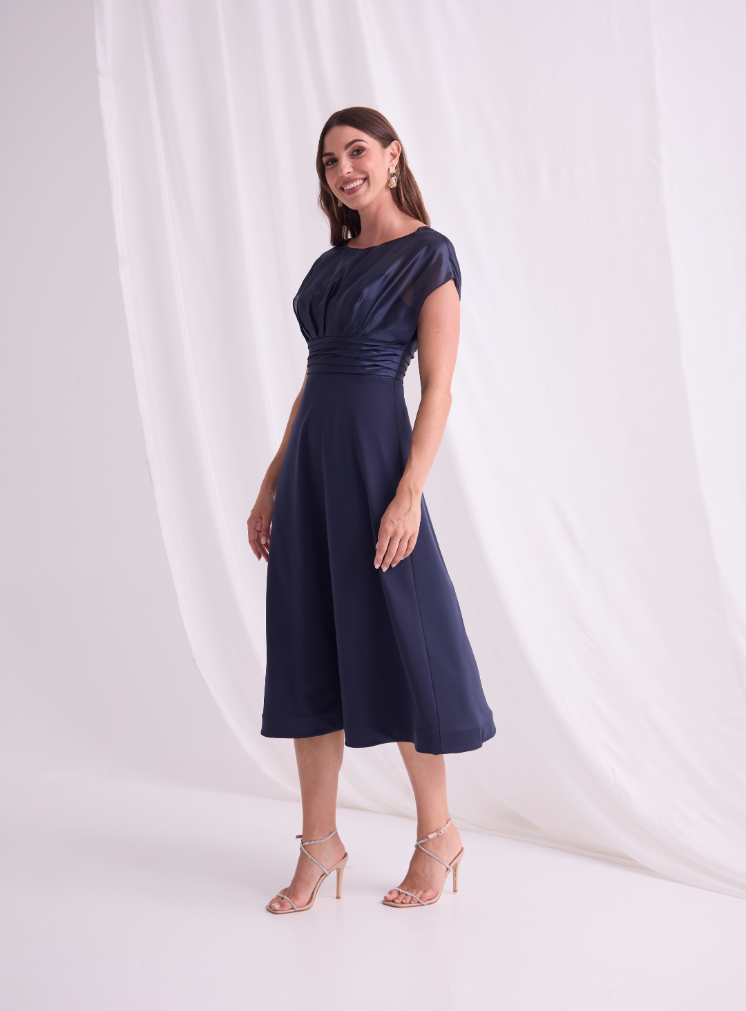 Navy A-line midi dress with cap sleeves.