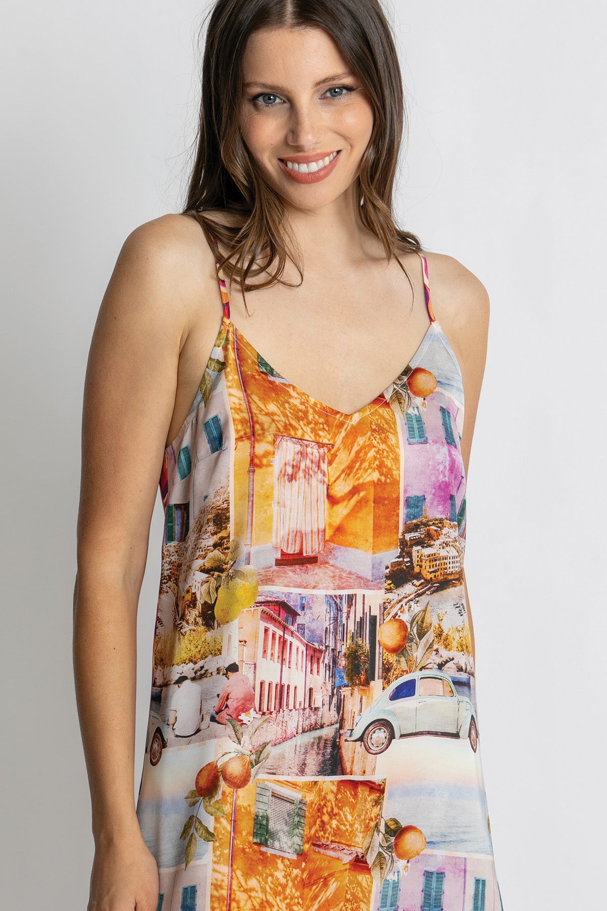 Close-up of colourful scenic print midi dress.