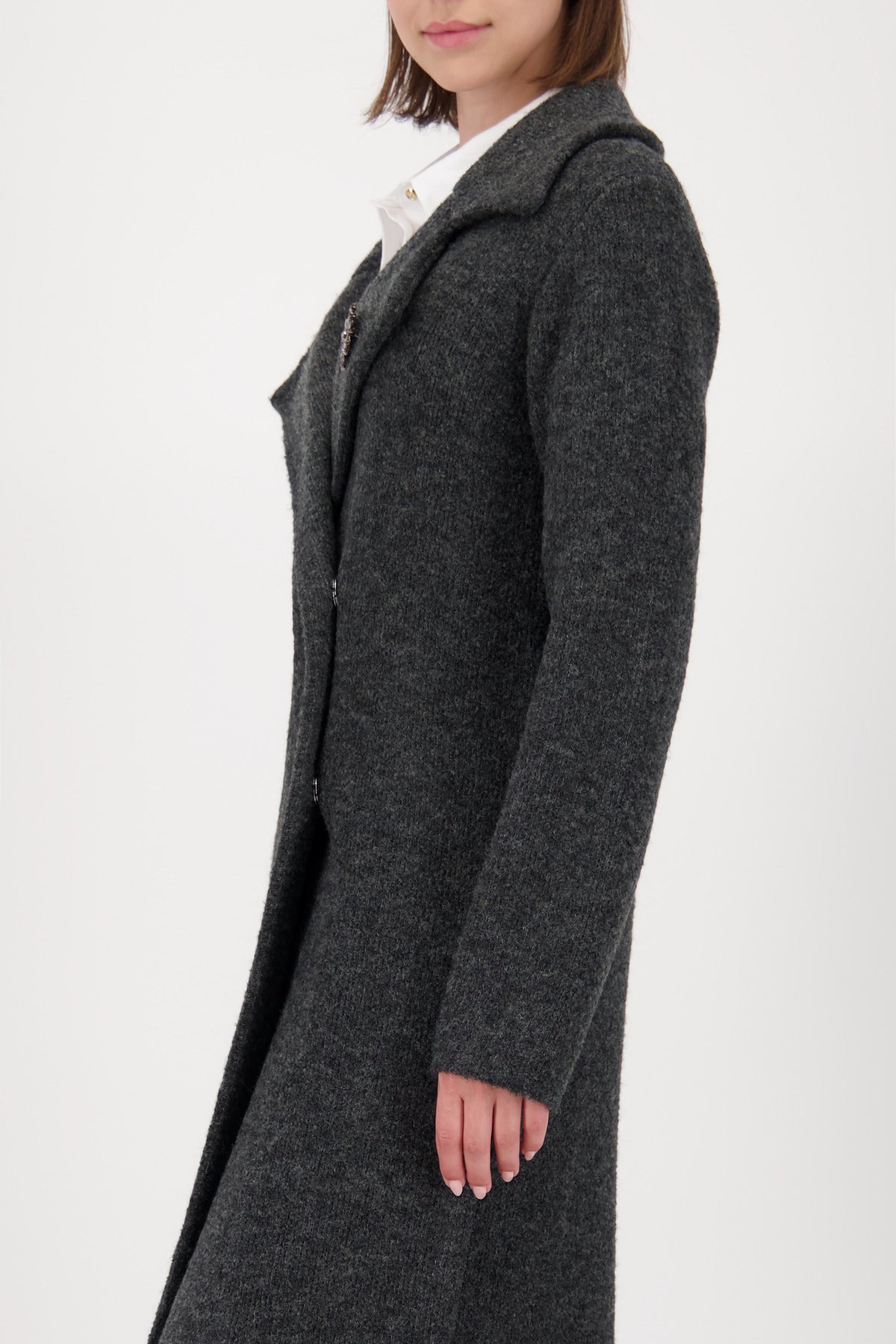 KN Coat Char gray side view worn by model on white background