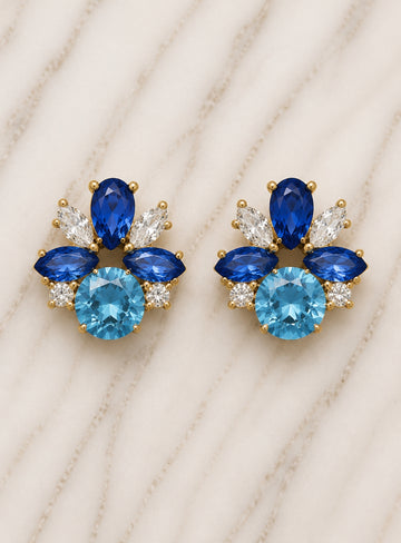 Showies Boutique royal blue floral crystal statement earrings on marble background