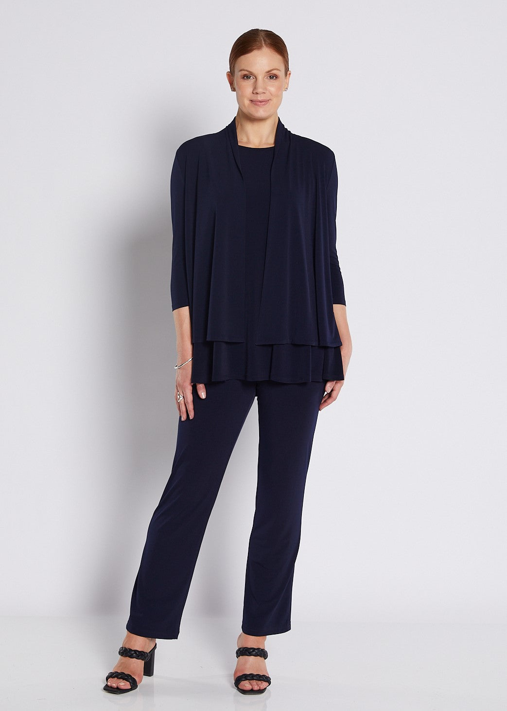Black high-rise wide-leg women’s pants with a clean tailored silhouette.