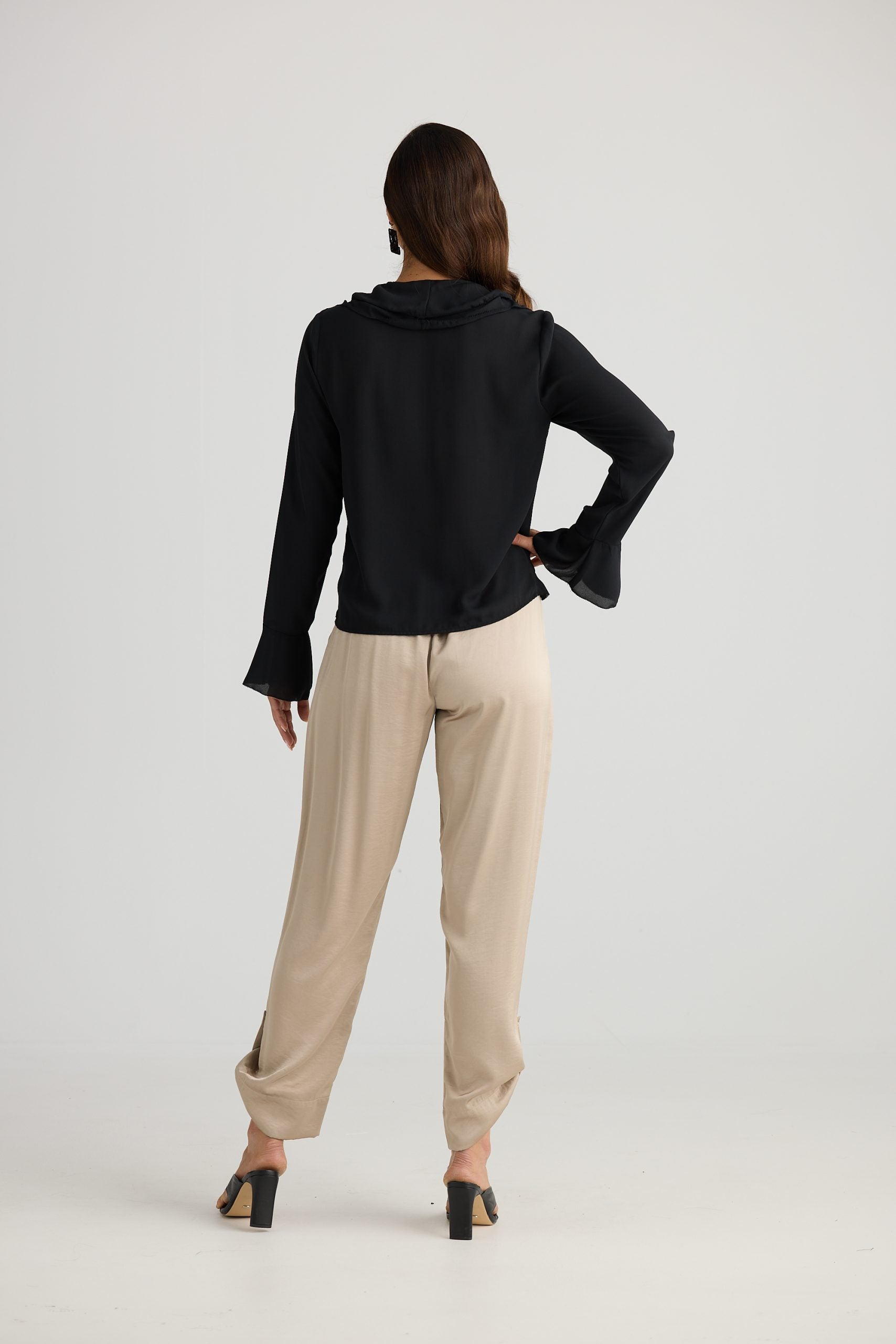 Harper black blouse with ruffle accents