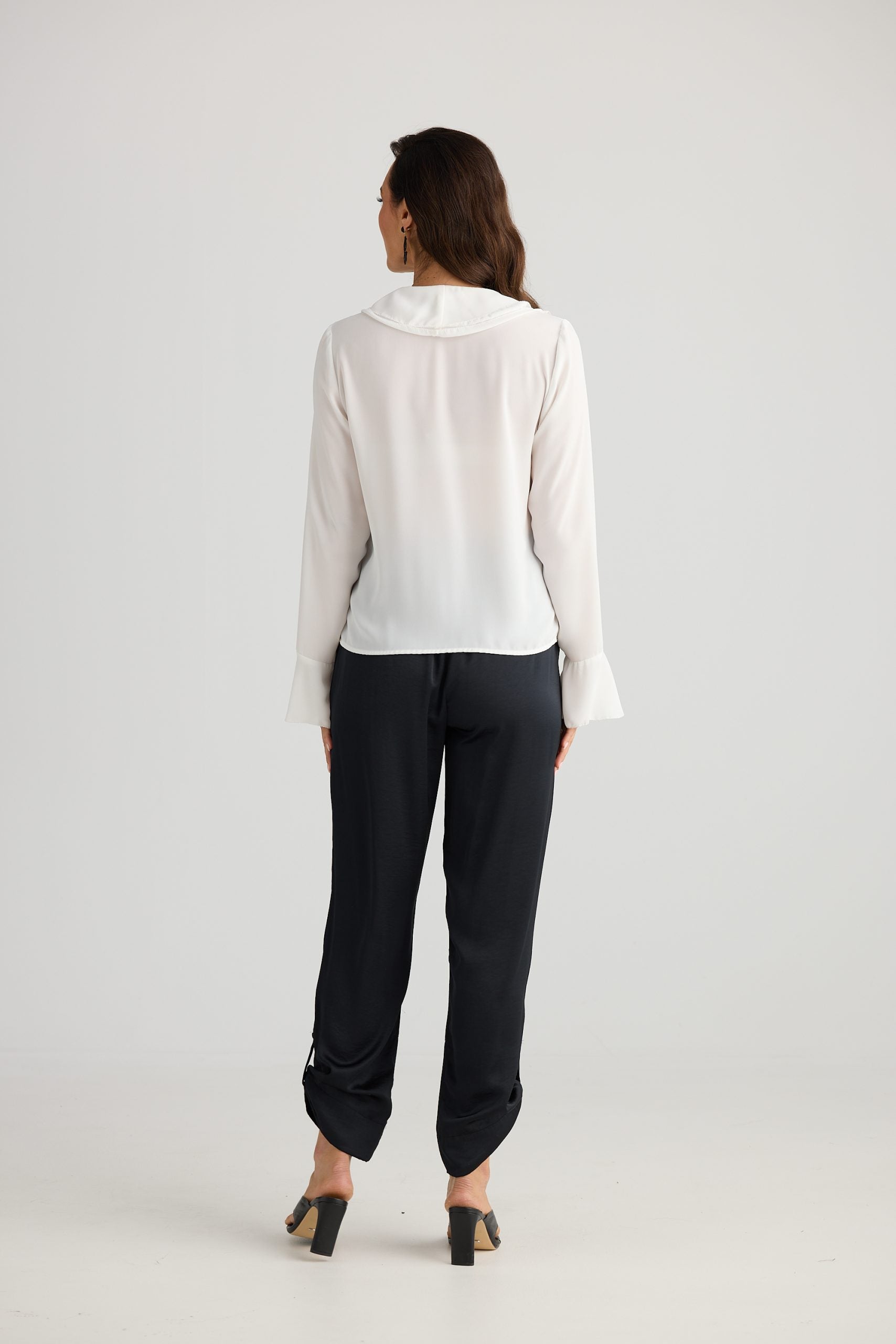 White feminine ruffle blouse style top