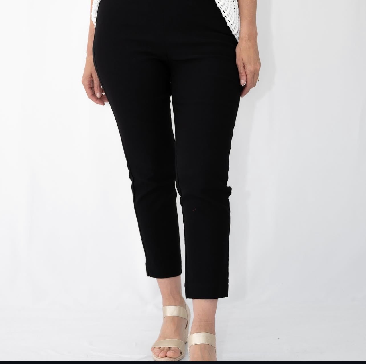 Women’s black cropped straight-leg pants with sandals