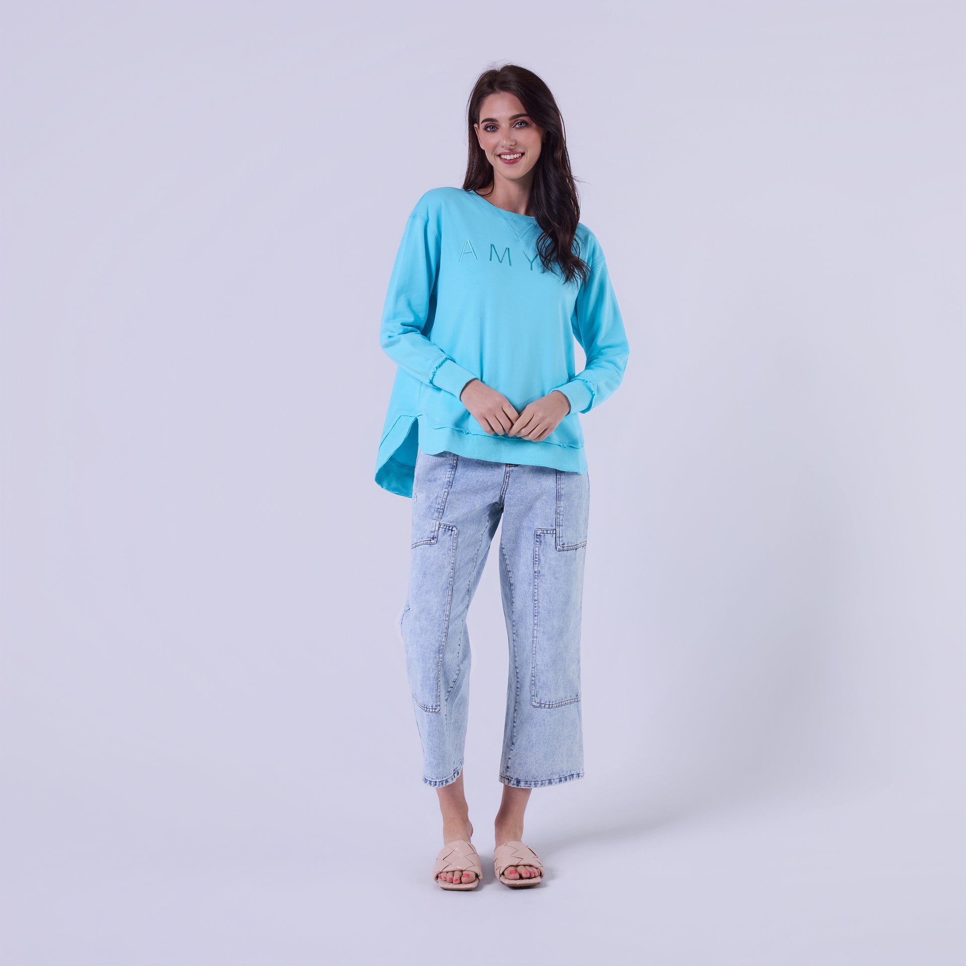 woman wearing blue relaxed fit sweatshirt casual outfit Showies Boutique Australia