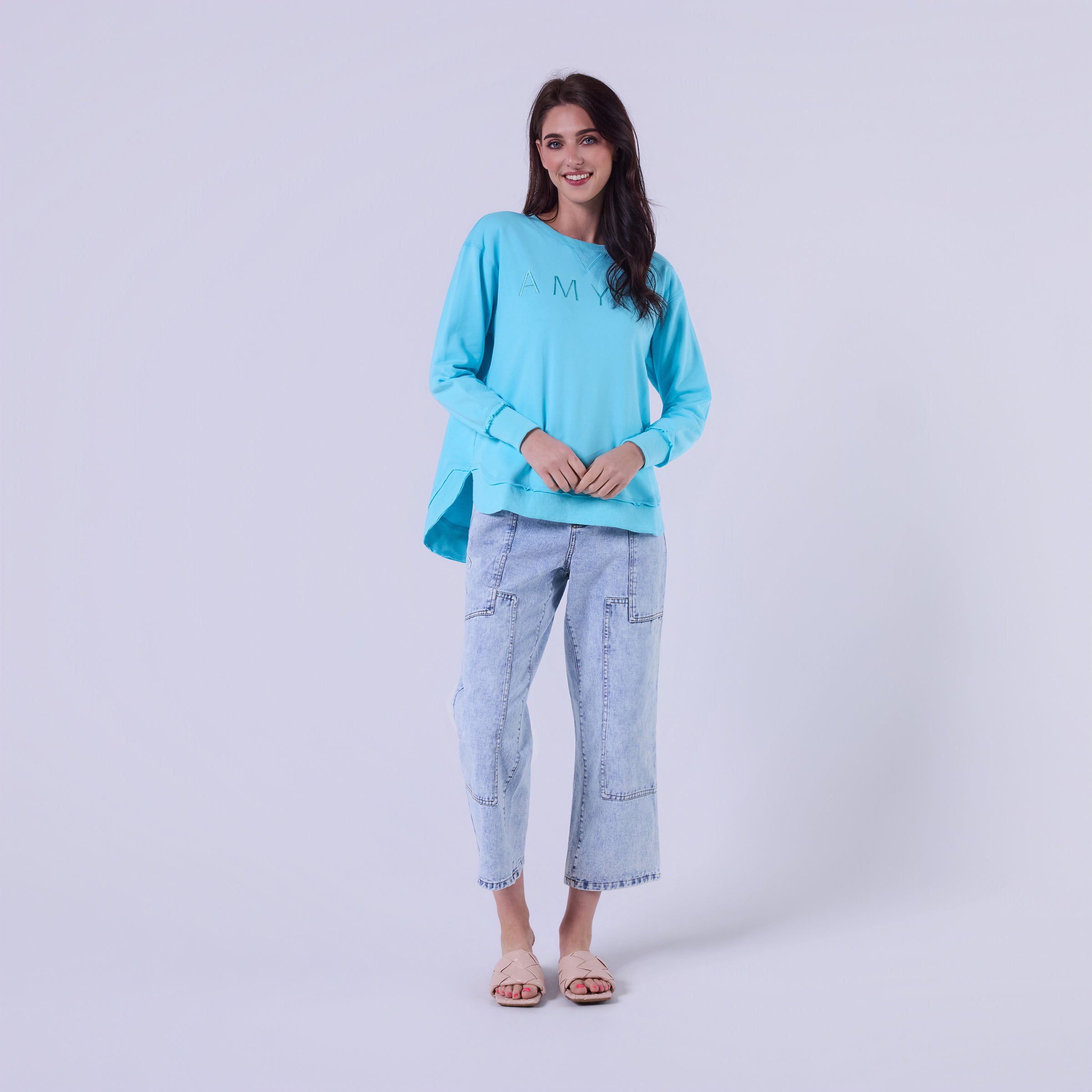 woman wearing blue relaxed fit sweatshirt casual outfit Showies Boutique Australia