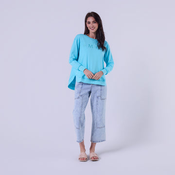 woman wearing blue relaxed fit sweatshirt casual outfit Showies Boutique Australia