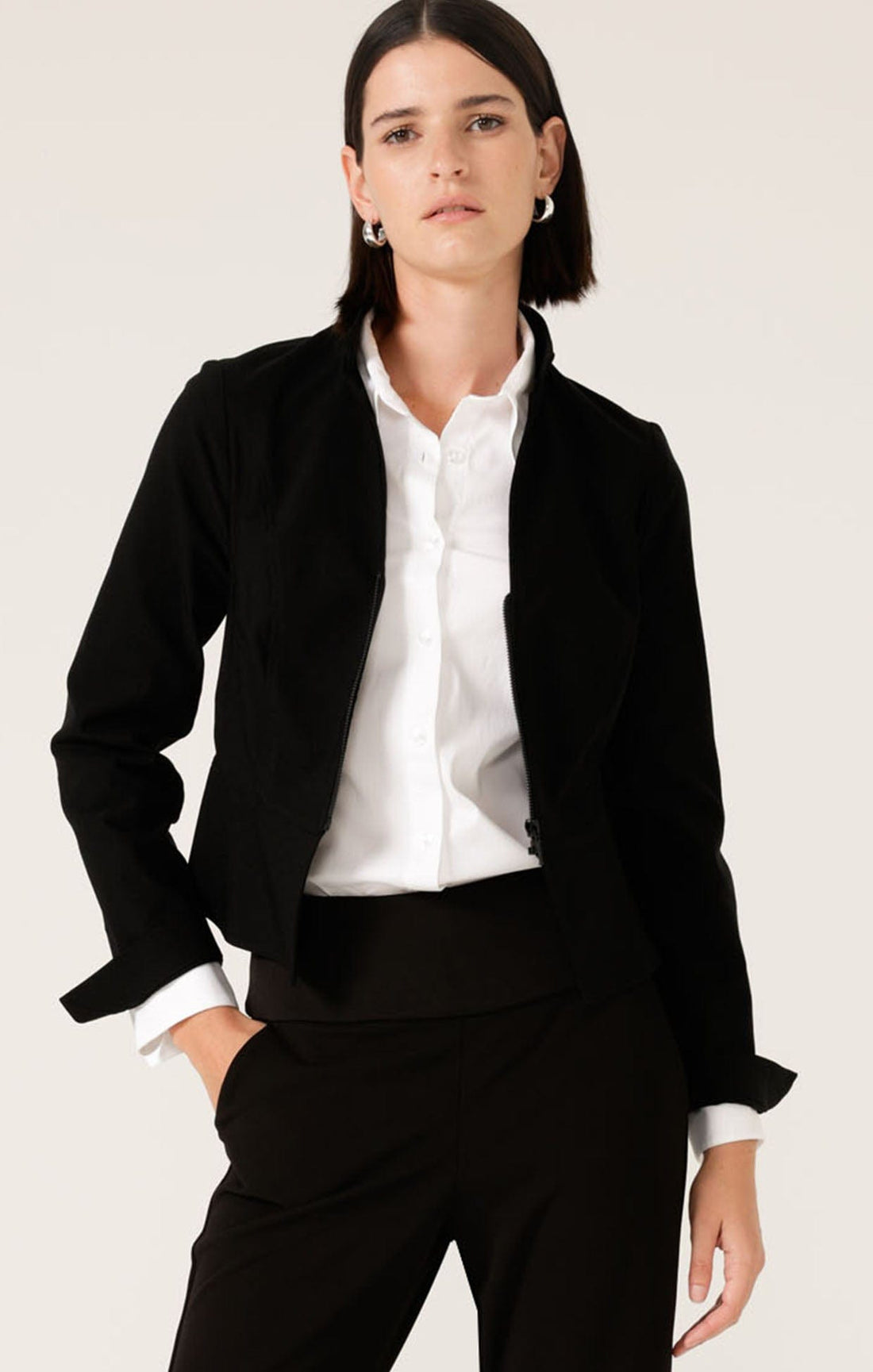 Front Zip Peplum Jacket In Black by Sacha Drake