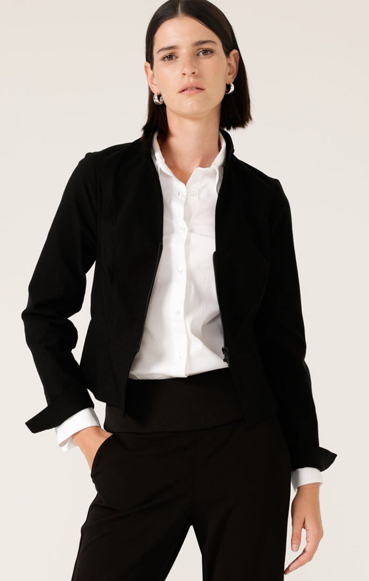 Front Zip Peplum Jacket In Black by Sacha Drake