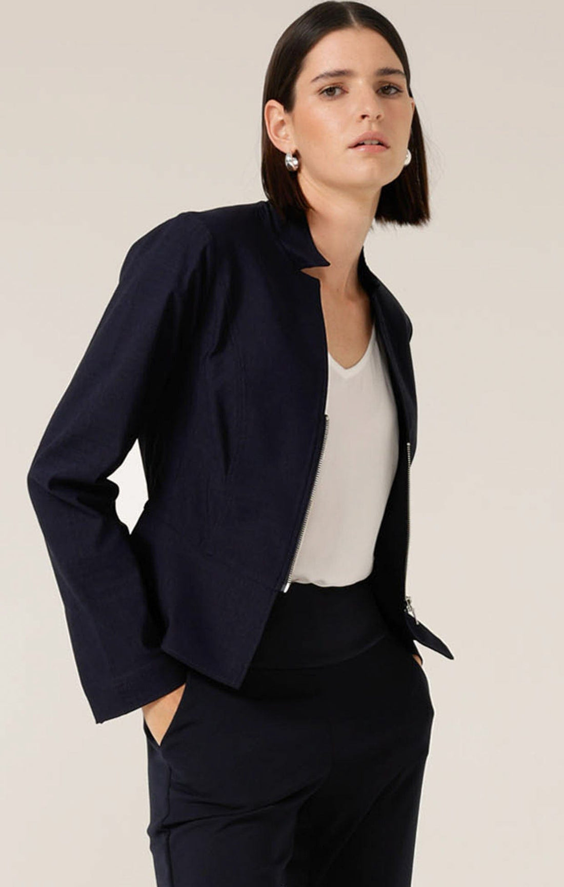 Front Zip Peplum Jacket In Navy by Sacha Drake