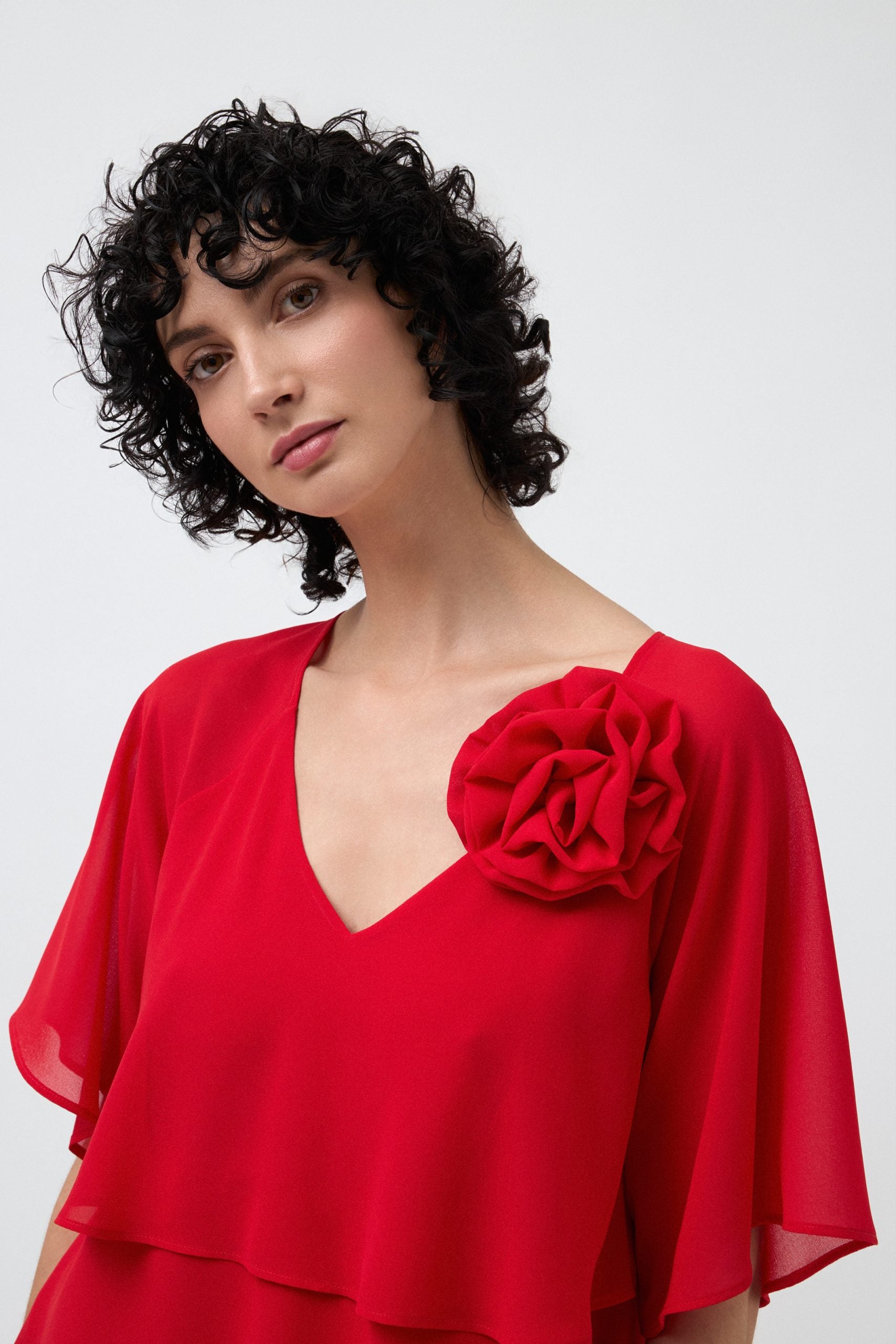 Red V-neck ruffle dress layered style