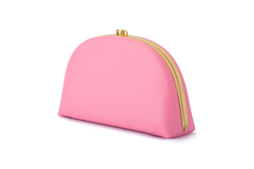Pink half-moon clutch bag with gold frame.