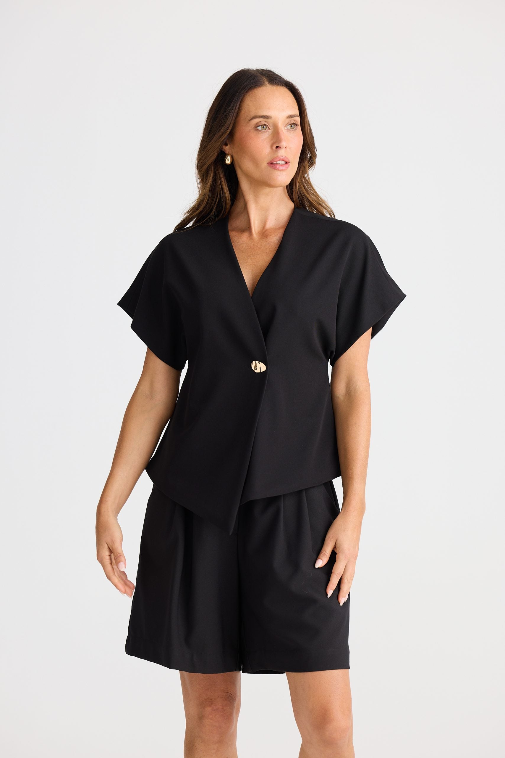 Structured origami-style V-neck fashion top