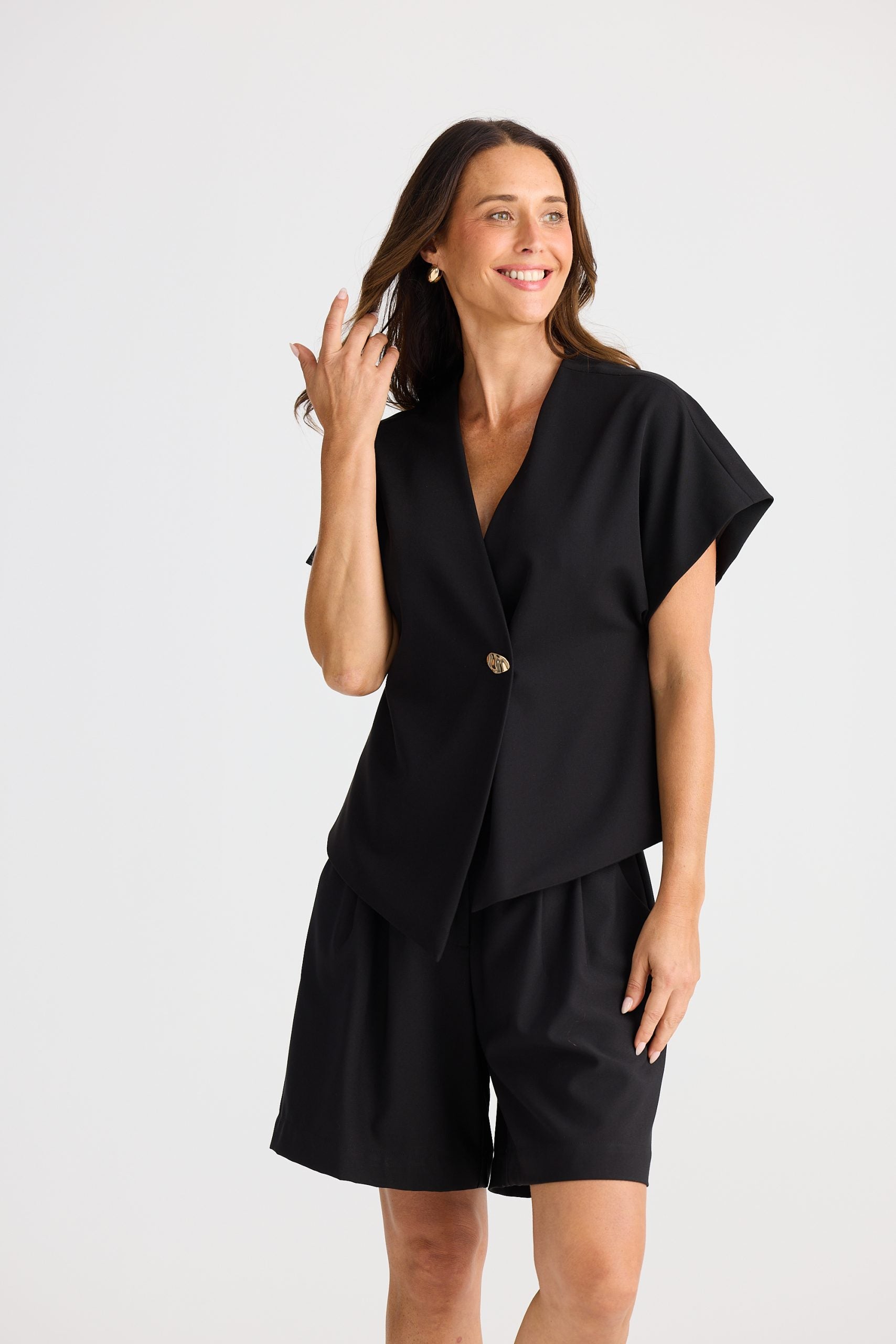 Fitted asymmetrical V-neck origami blouse