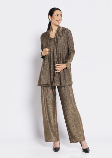 Women’s sparkle gold cardigan and wide leg pants set on white background.