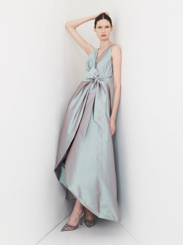 Mint satin wrap gown with deep V-neckline and waist tie.