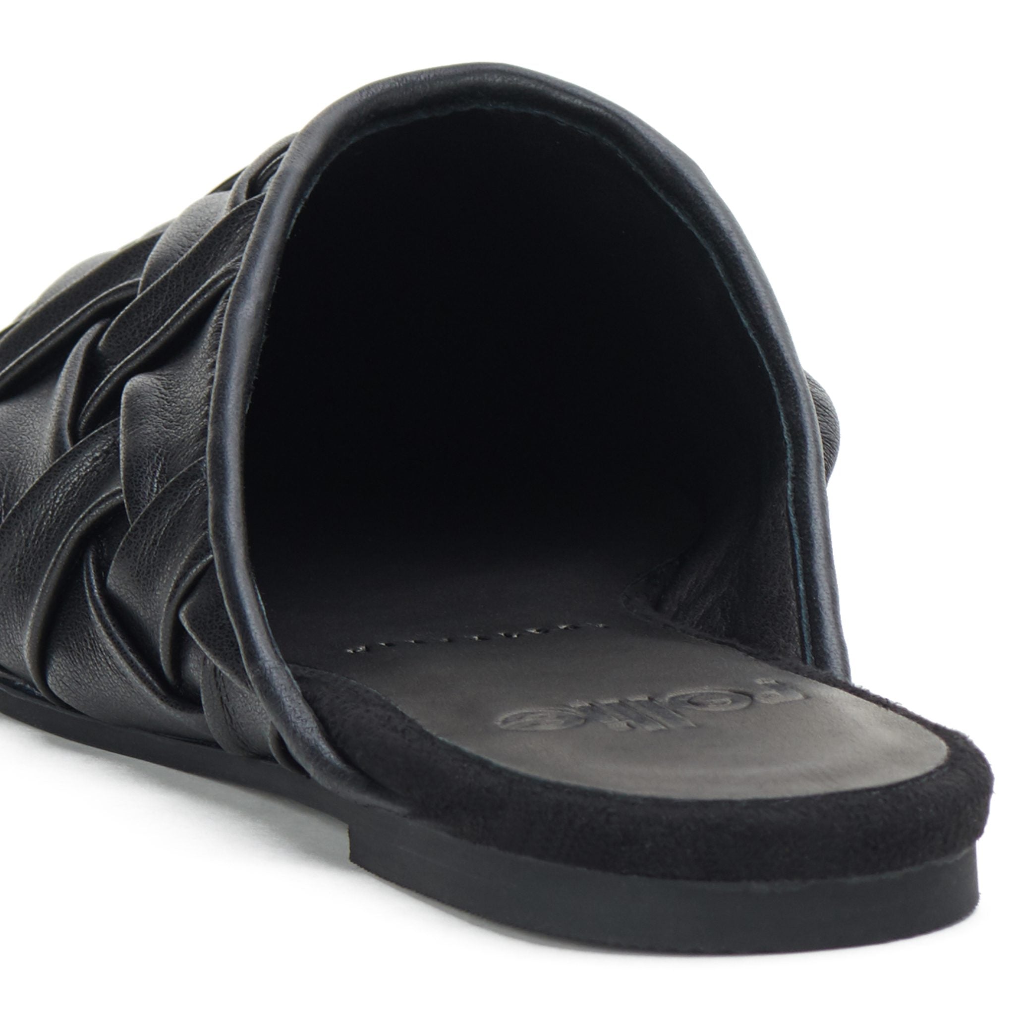 Braided black mule sandal detail with cushioned sole