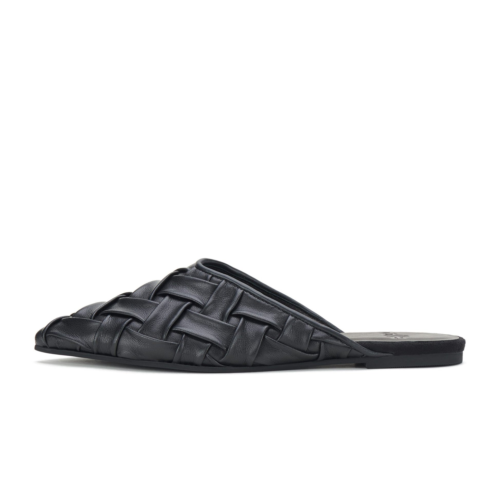 Side view of black pointed woven slide sandals