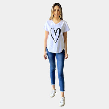 woman wearing white heart print t shirt casual outfit Showies Boutique Australia
