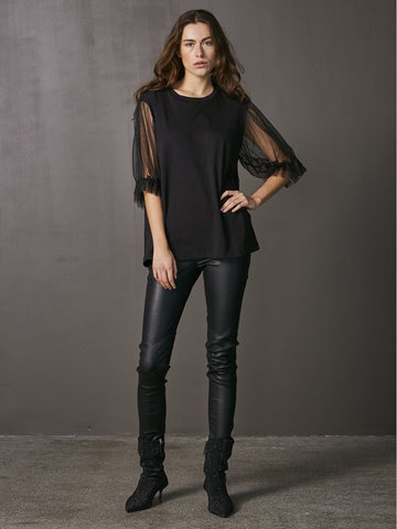 The Vigga Tee is the perfect blend of elegance and versatility. The delicate mesh sleeves give it a chic edge, making it easy to dress up or down.