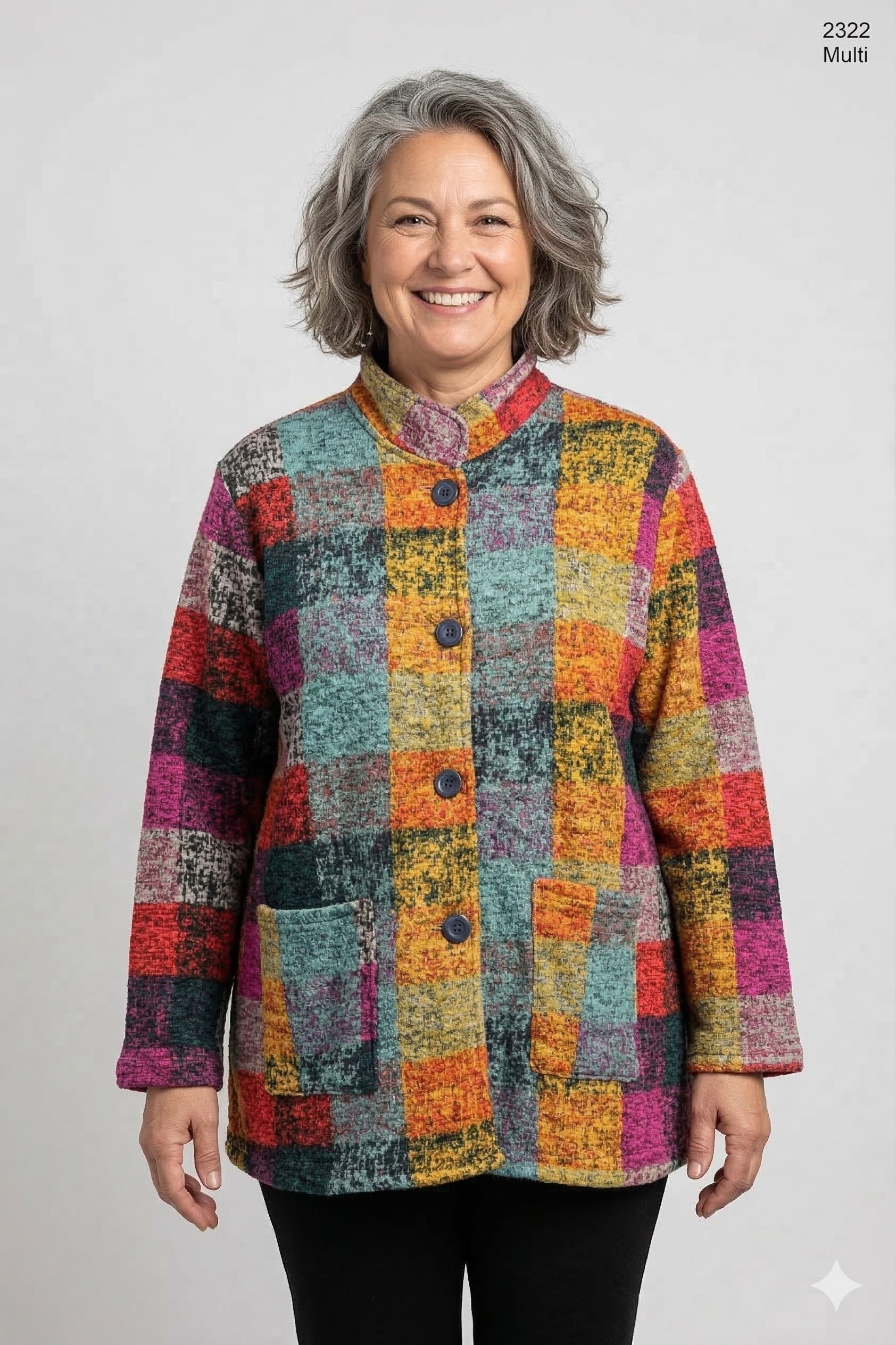 Woman wearing a multicolor patchwork cotton jacket with button front and pockets on a white background