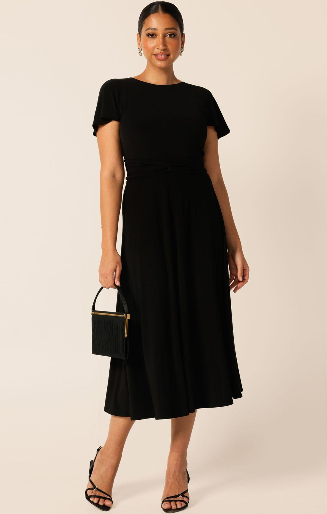 Flute Sleeve Reverse Wrap In Black by Sacha Drake
