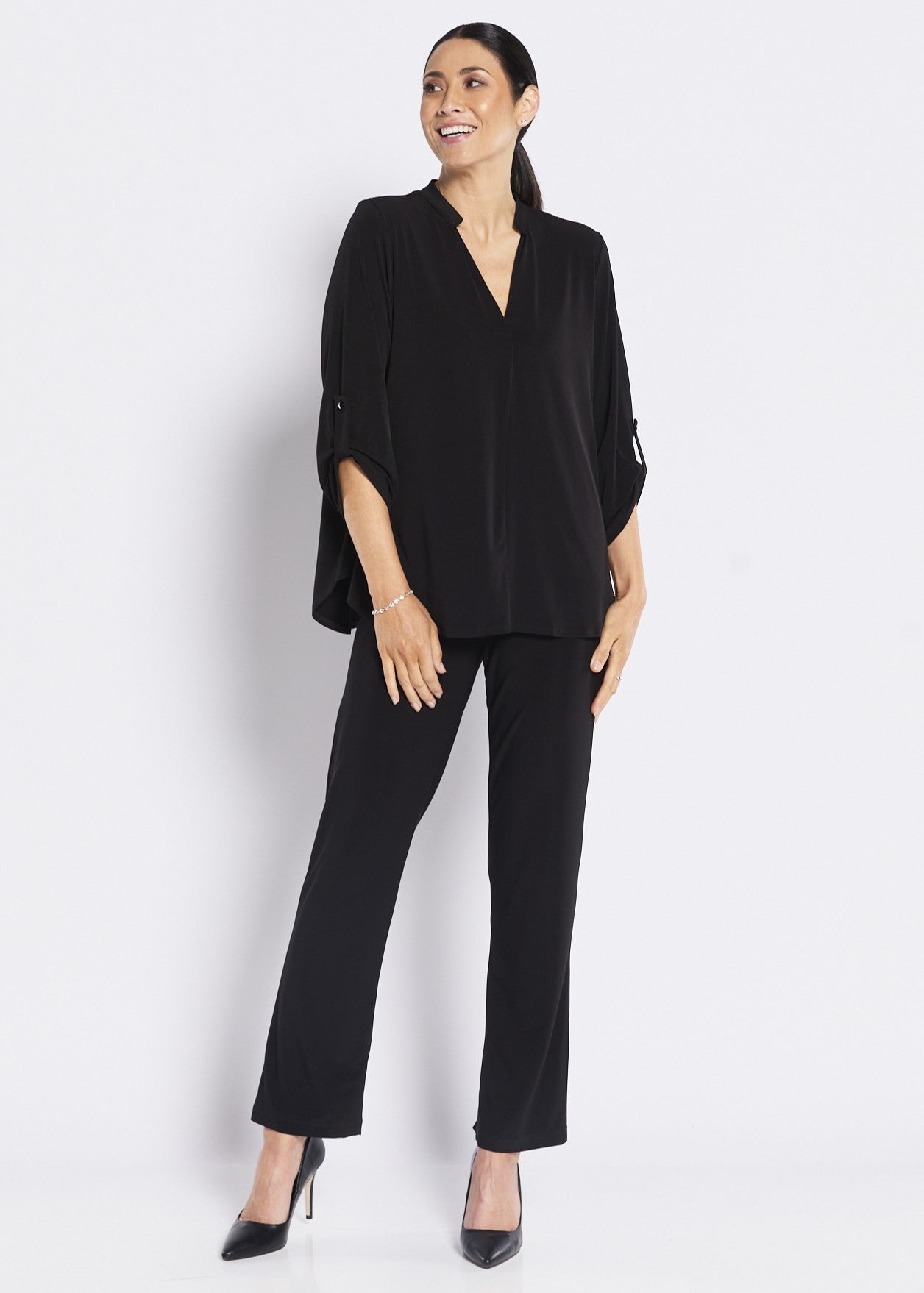 Women’s black relaxed fit blouse with ankle length straight pants formal outfit