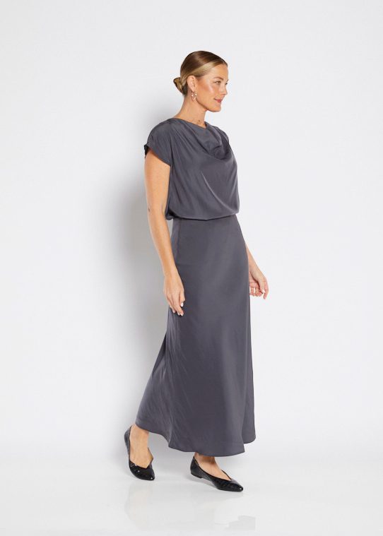 Philosophy maxi bias skirt is a longer length skirt with a fluted hem, wear with sneakers, slides, boots or heels depending on the vibe you're going for.